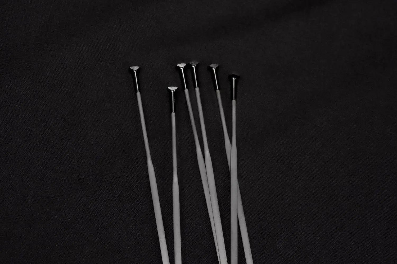 Carbon Spokes: Why They Break and How to Prevent It - Particle